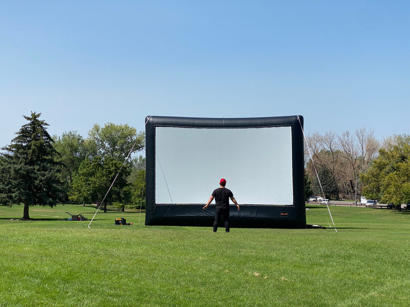 Sealed vs. breathing inflatable outdoor movie screens