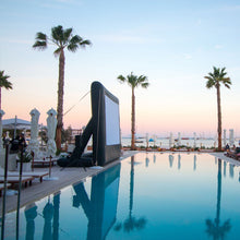 Load image into Gallery viewer, Pro 12’ x 7’ Inflatable Screen by the pool
